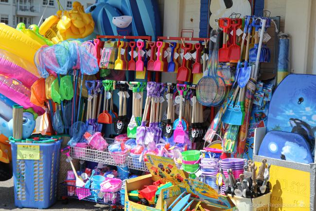 Buckets, spades and beach items in seafront shop